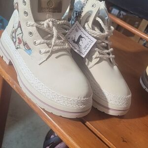Beige High-Top Boots with Patterned Accents